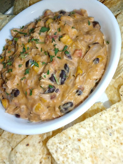 A picture of Cheesy Black Bean & Corn Buffalo Chicken Dip.