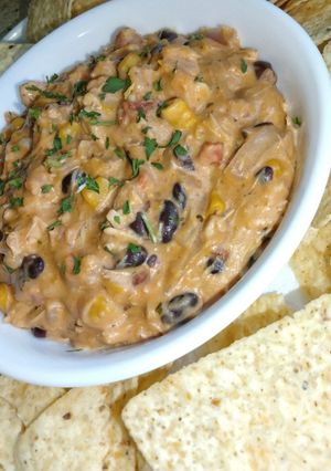 A picture of Cheesy Black Bean & Corn Buffalo Chicken Dip.