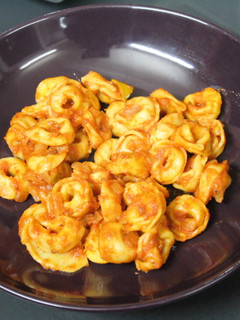 Una foto de Tortellini de carne con sofrito