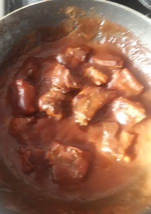 Una foto de Costillas con salsa de arándano picosa
