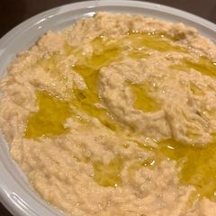 A picture of Smoky Lebanese Baba Ghanouj (Aubergine Moutabbal) - the real stuff 🔥.