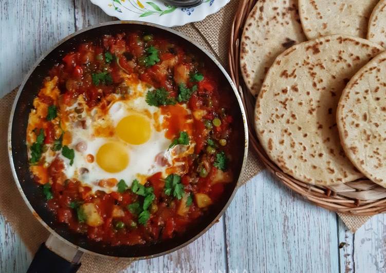 Simple Way to Prepare Ultimate Shakshuka (In my style- Poached eggs in tomato and veggie gravy)