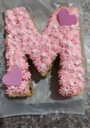 Una foto de Mini torta de letra