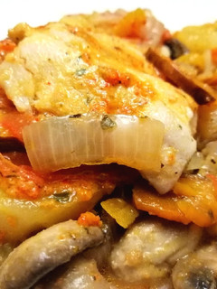 Una foto de Volteado de Filete de Pescado, Vegetales & Papas