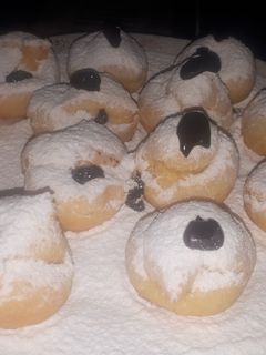 Una foto de Buñuelitos de azúcar y chocolate😋
