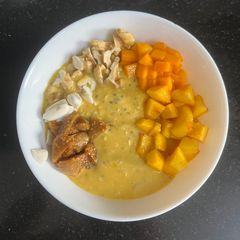 A picture of Breakfast Bowl With Oats, Nuts, fruits & Chia Seeds.