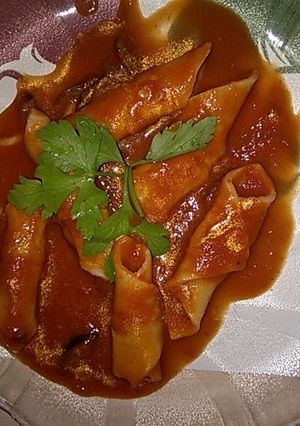 Una foto de Garganelli con Salsa Puttanesca