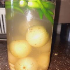 A picture of Pickled gooseberries (uppilitta nellikai).