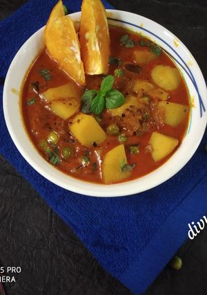 A picture of Orange aloo curry.
