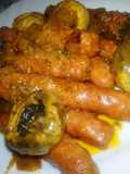 Salchichas frescas en salsa de vino con champiñones
