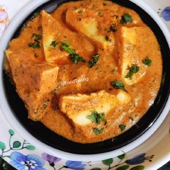 A picture of Paneer Butter Masala (no onion, garlic).