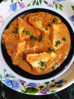 A picture of Paneer Butter Masala (no onion, garlic).