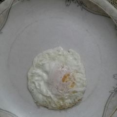 A picture of Half fri egg.