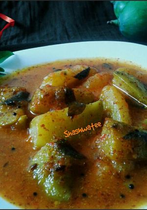 A picture of Amba khatta (A sweet sour mango relish with mustard paste).