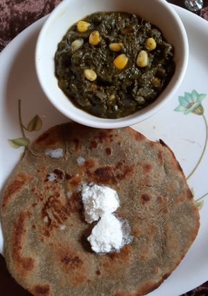 A picture of Bajre ki roti Sarso ke saag ke sath.