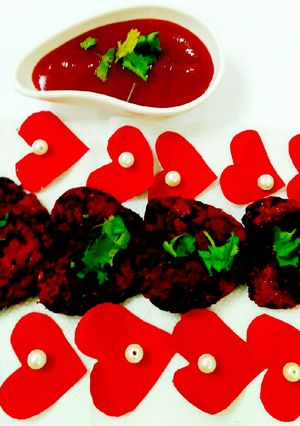 A picture of Baked Beetroot & Carrot tikki.