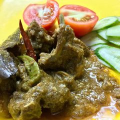 A picture of Sabz Gosht.(green mutton curry).