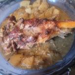 Young Goat Leg with Potatoes, Onions and Gravy