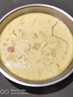 A picture of Steam Egg with Sesame Seeds.