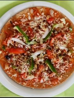ખાખરા પિઝા(Khakhra Pizza Recipe in Gujarati) રેસીપી મુખ્ય ફોટો