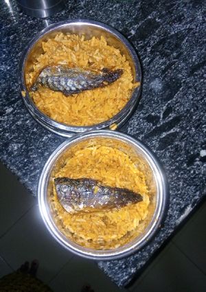 A picture of Jollof rice with fish.