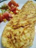 Omelette simple relleno de jamón y queso
