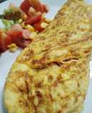 Omelette simple relleno de jamón y queso