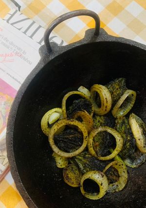 A picture of Halka Pulka Bharwa Karela (Stuffed bitter gourd).