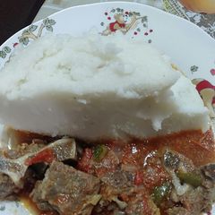 A picture of Ugali with meat stew.