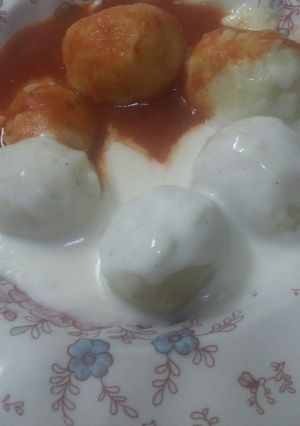 Una foto de Ñoquis de papa rellenos