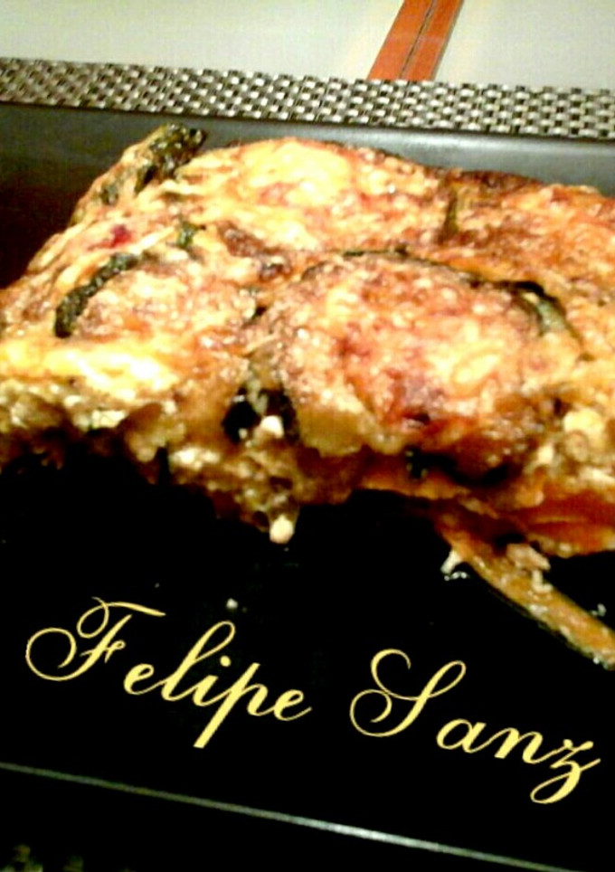 Una foto de Pastel de calabacín verduras y langostinos