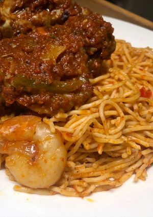 A picture of Jollof spaghetti (restaurant version).