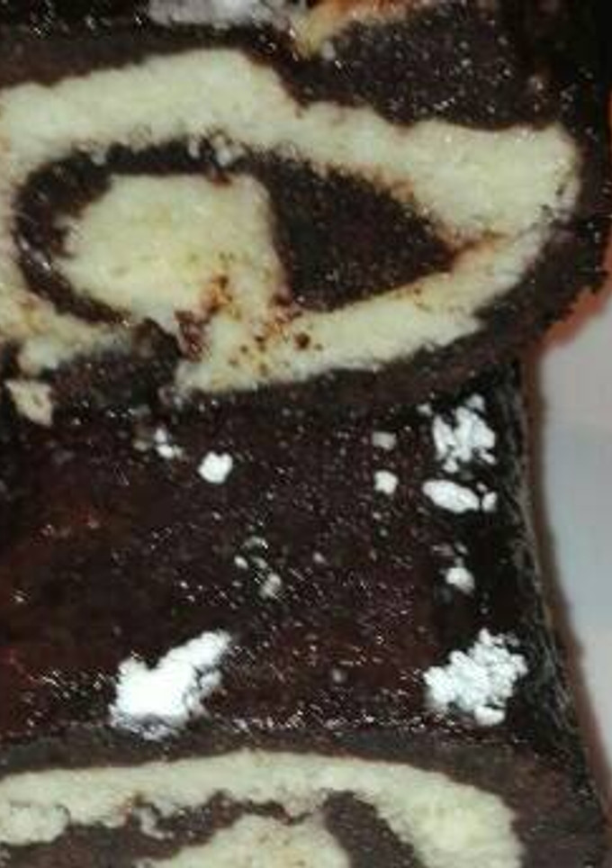 Una foto de Brazo de chocolate y crema de queso fresco