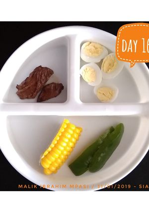 A picture of Baby Food: Tenderloin Strips, Quail Eggs, Corn, Green Bell Pepper.