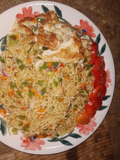 A picture of Garnished Fried Noodles.