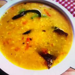 A picture of Yellow Bhuna Moong Dal with Coconut.