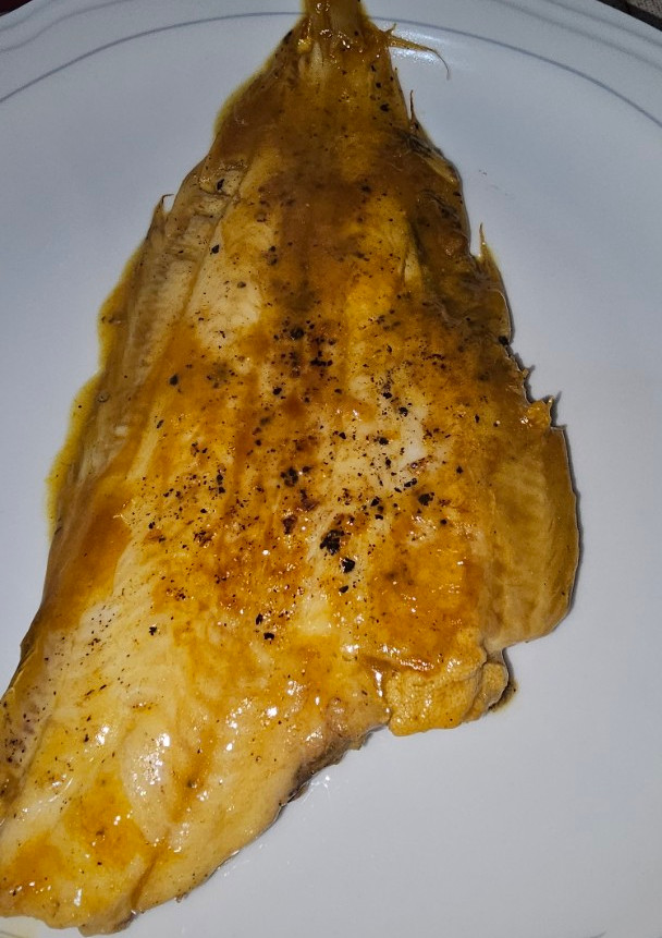 Una foto de Lenguado en salsa de naranja
