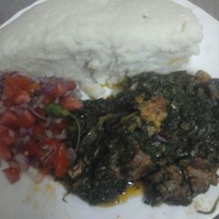 A picture of Ugali and sukumawiki,spinach with meat #localfoodcontest_mombasa.