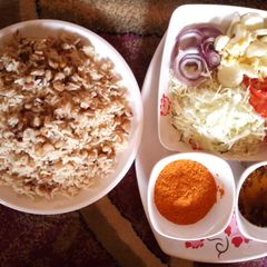 A picture of Rice and beans with oil and chill(garau garau).