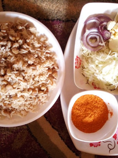 A picture of Rice and beans with oil and chill(garau garau).