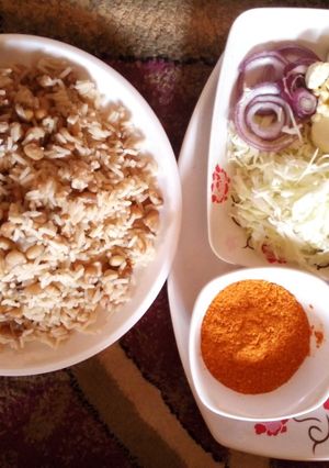 A picture of Rice and beans with oil and chill(garau garau).