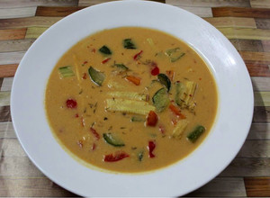 A picture of Vegetables In Thai Red Curry.