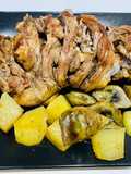 Agnello al forno con patate e carciofi