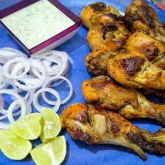 A picture of Smoky chicken leg piece.