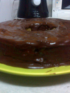 Una foto de Torta arena con cobertura de chocolate