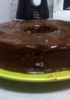 Una foto de Torta arena con cobertura de chocolate