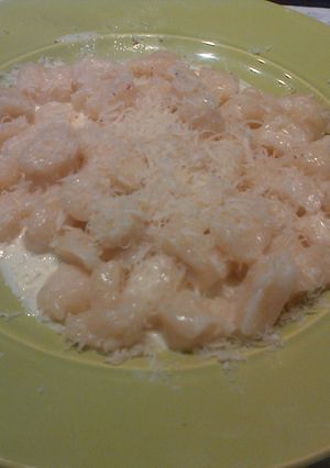 Una foto de Ñoquis de queso