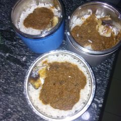 A picture of White rice and fish.