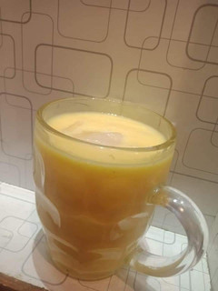 A picture of Mango smoothie or shake.