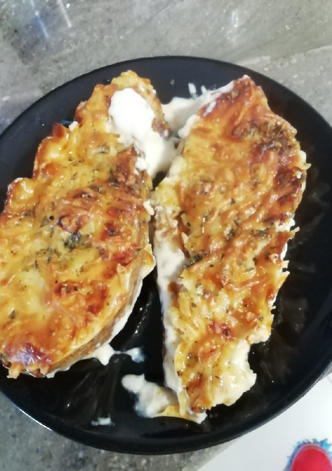 Una foto de Berenjena rellena de marisco